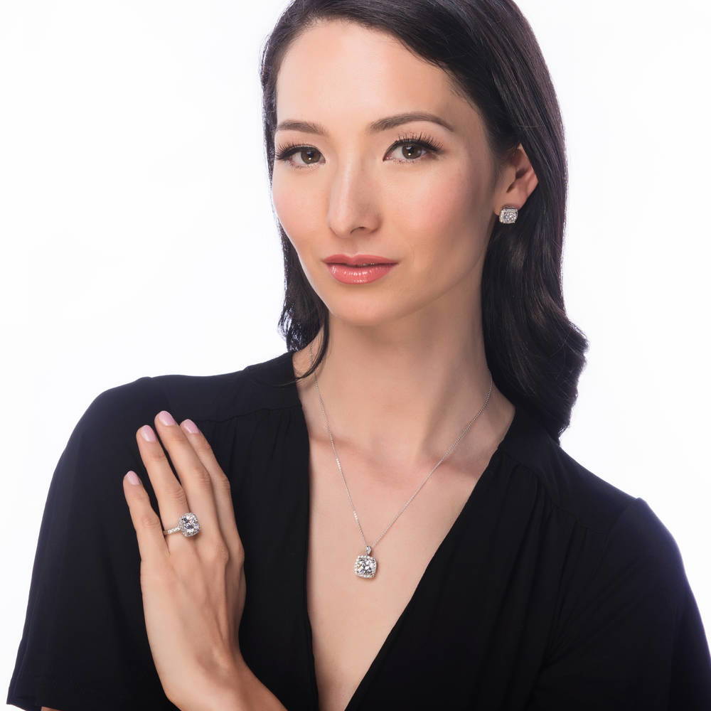 Model wearing Halo Cushion CZ Stud Earrings in Sterling Silver, 3 of 3