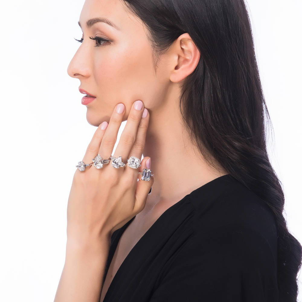 Model wearing 3-Stone 5.7ct Pear CZ Ring in Sterling Silver, 9 of 10