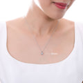 Model wearing Solitaire Princess CZ Necklace in Sterling Silver, 6mm