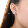 Model wearing Solitaire Bezel CZ Stud Earrings in Gold Flashed Sterling Silver, 8mm