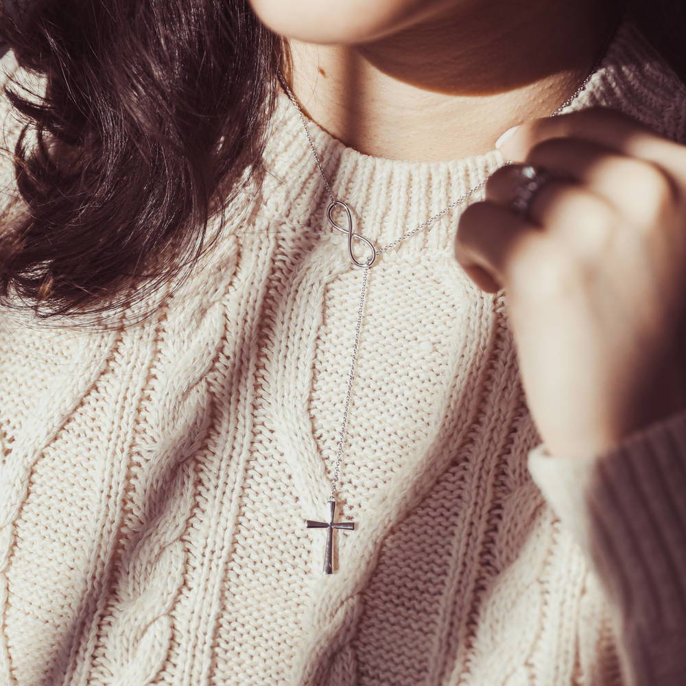 Model wearing Infinity Cross Lariat Necklace in Sterling Silver, 3 of 7