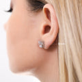 Model wearing Solitaire Cushion CZ Stud Earrings in Sterling Silver, 5mm