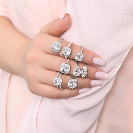 Image Contain: Model Wearing 3-Stone Ring, Halo Ring, Halo Split Shank Ring