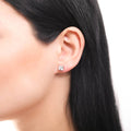 Model wearing Solitaire CZ Stud Earrings in Sterling Silver 2.5ct, Clear Color