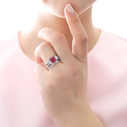 3-Stone Criss Cross 3ct Ruby-Red CZ Ring Set in Sterling Silver