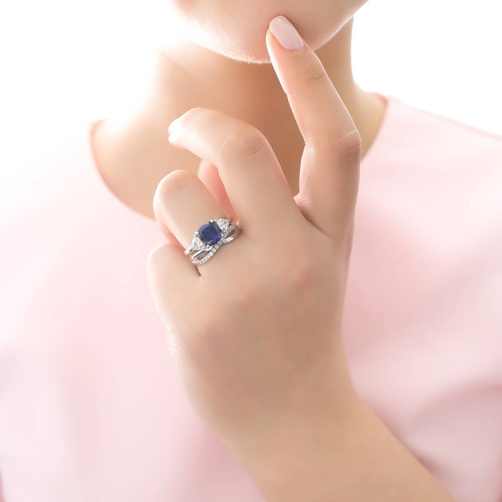 Model wearing 3-Stone Criss Cross Sapphire-Blue CZ Ring Set in Sterling Silver, 2 of 16