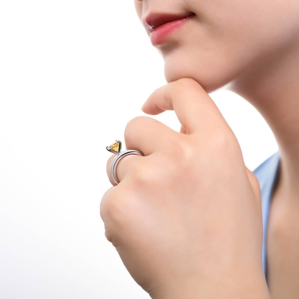 Model wearing Solitaire Canary Yellow Cushion CZ Ring Set in Sterling Silver, 3 of 9