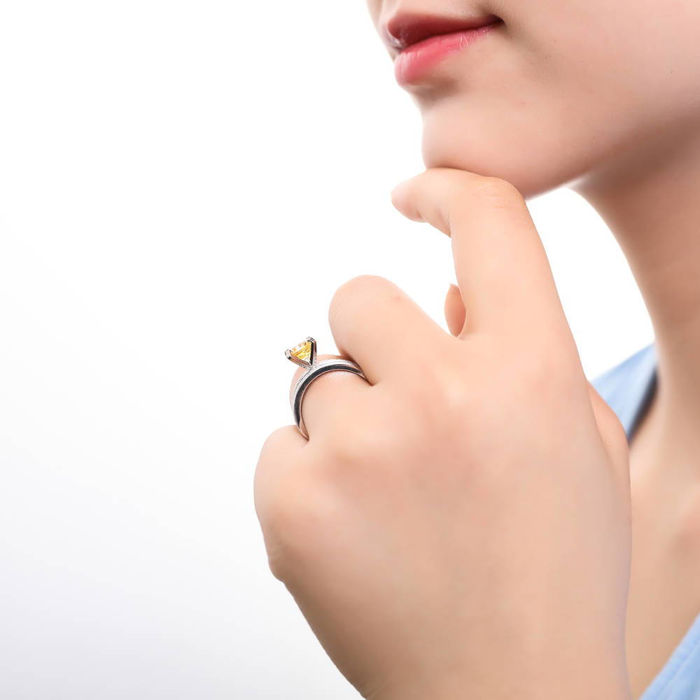 Model wearing Solitaire Canary Yellow Cushion CZ Ring Set in Sterling Silver, 3 of 9