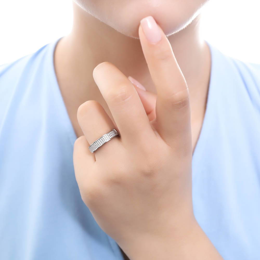 Model wearing Pave CZ Eternity Ring in Sterling Silver, 2 of 6