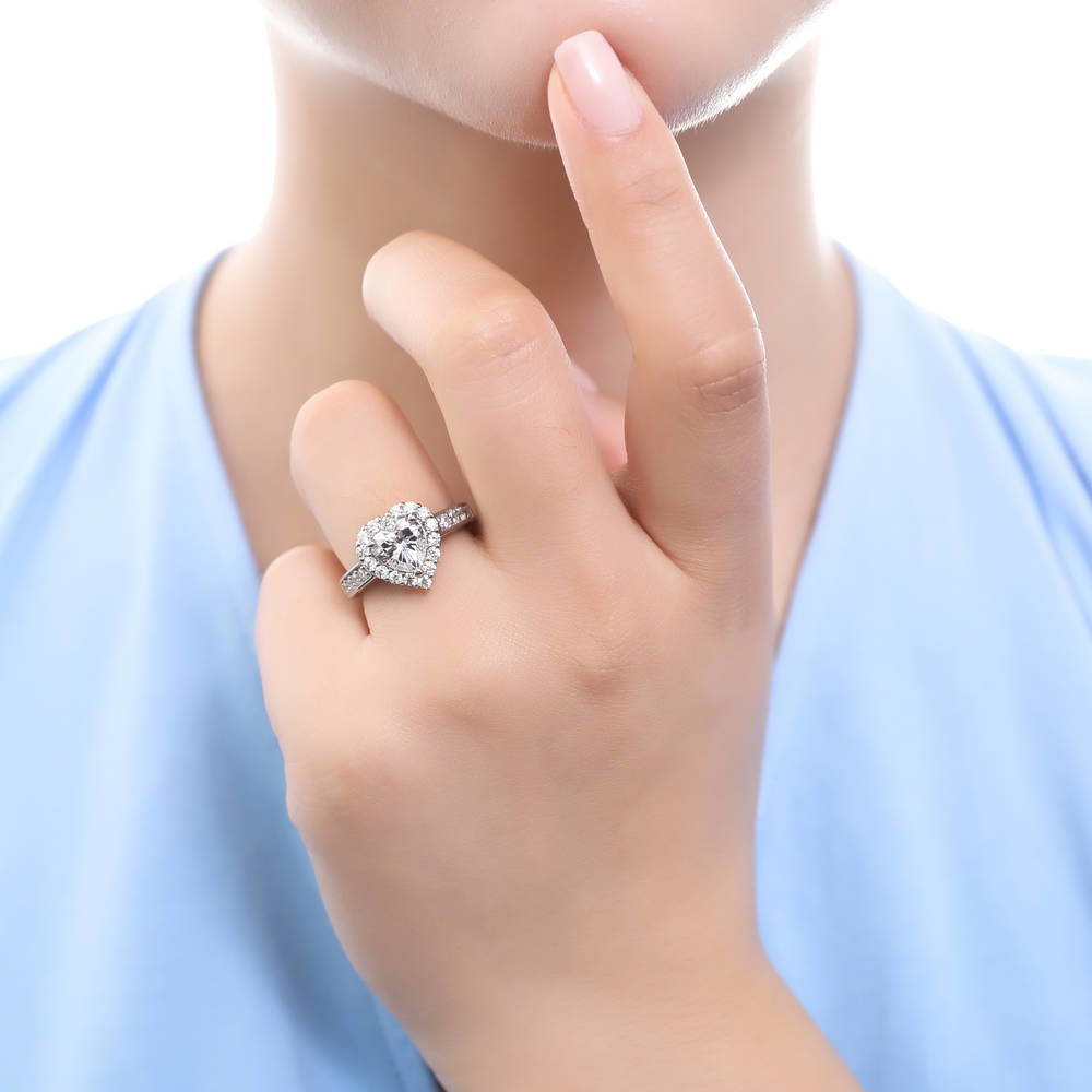 Model wearing Halo Heart Heart CZ Ring in Sterling Silver, 2 of 8