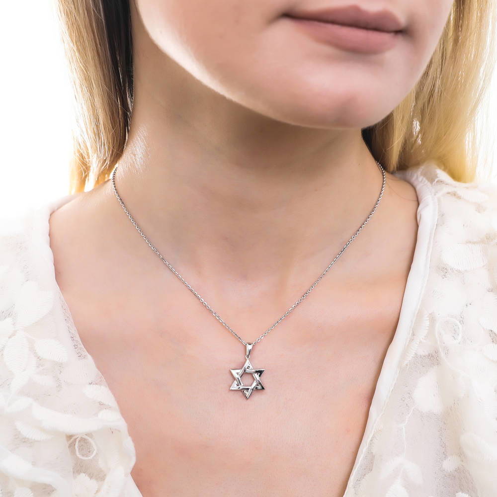 Model wearing Star of David Necklace and Earrings in Sterling Silver, 10 of 14