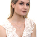 Model wearing Solitaire CZ Stud Earrings in Sterling Silver 2.5ct, Clear Color