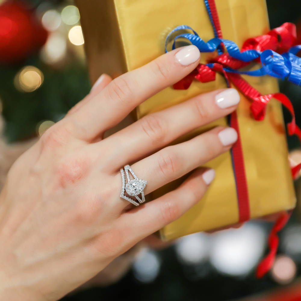 Model wearing Halo Wishbone Pear CZ Split Shank Ring Set in Sterling Silver, 6 of 17