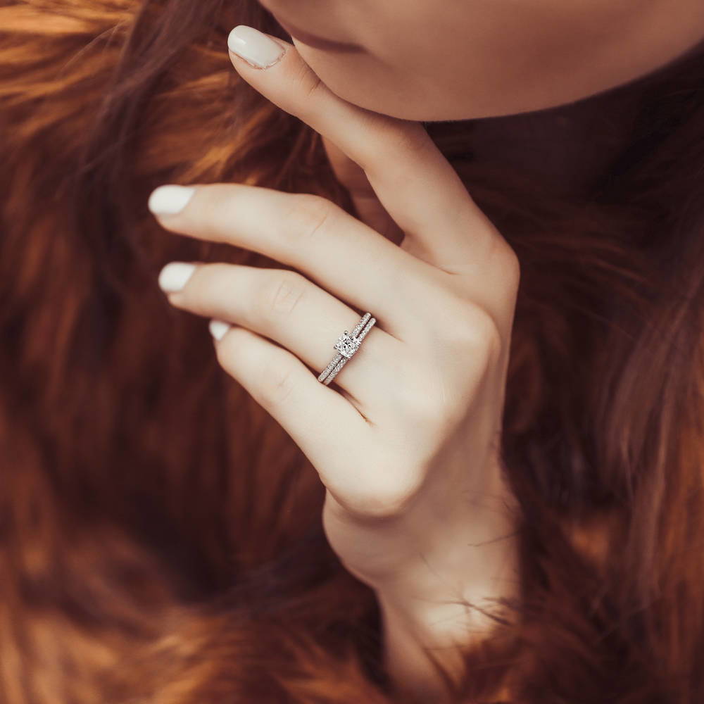 Model wearing Solitaire 0.6ct Cushion CZ Ring Set in Sterling Silver, 2 of 10