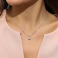 Model wearing Solitaire CZ Necklace in Sterling Silver, Round Cut / Yellow