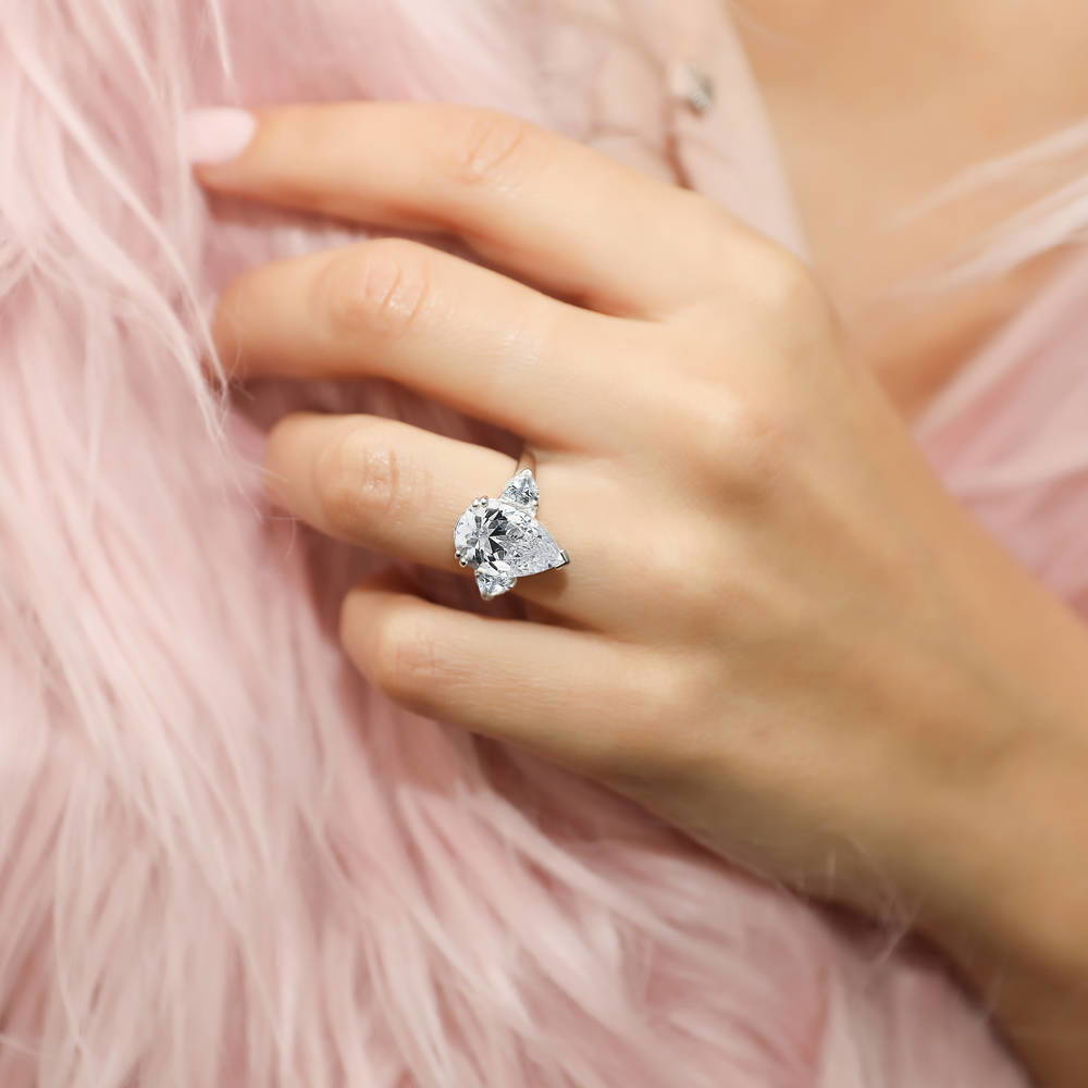 Model wearing 3-Stone 5.7ct Pear CZ Ring in Sterling Silver, 2 of 10