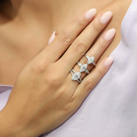 Image Contain: Model Wearing 3-Stone Ring, Halo Split Shank Ring, Solitaire with Side Stones Ring