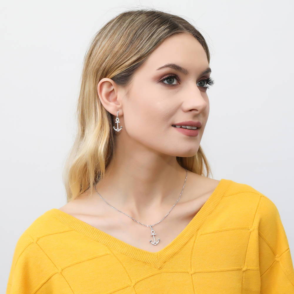 Model wearing Anchor CZ Dangle Earrings in Sterling Silver, 4 of 4