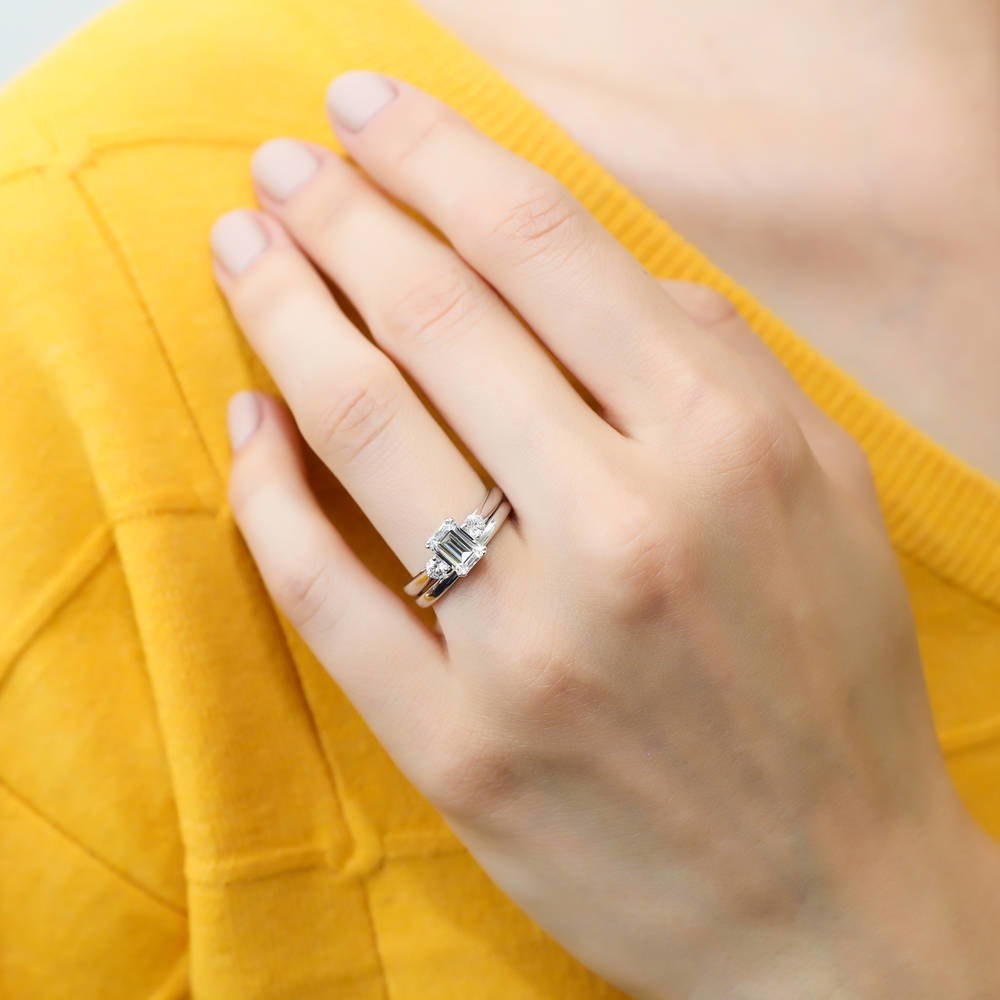 Model wearing 3-Stone 1ct Emerald Cut CZ Ring Set in Sterling Silver, 2 of 12