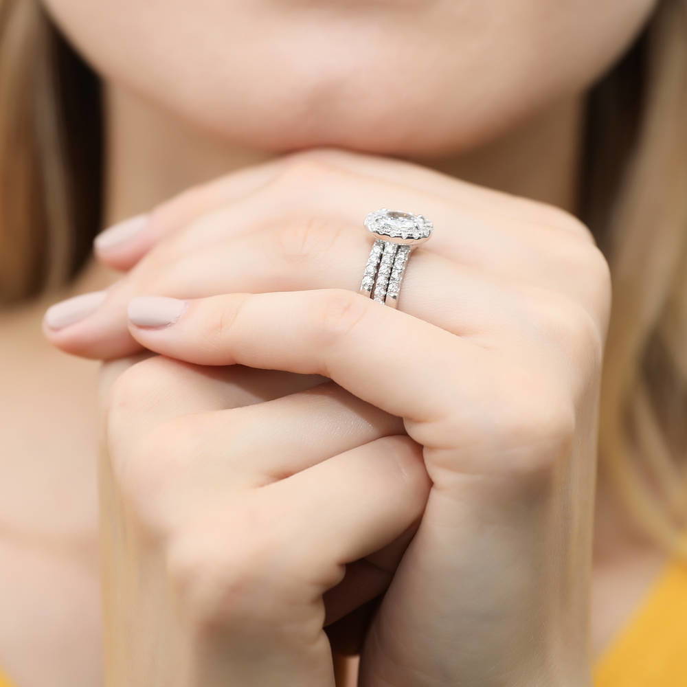 Model wearing Halo Oval Cut CZ Ring in Sterling Silver, 13 of 14