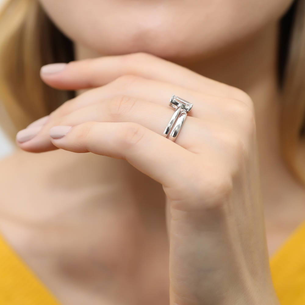 Model wearing Solitaire 2.1ct Emerald Cut CZ Ring Set in Sterling Silver, 10 of 13