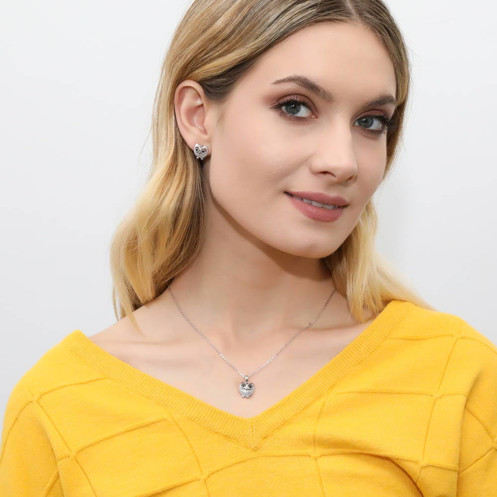 Model wearing Owl CZ Stud Earrings in Sterling Silver, 4 of 4
