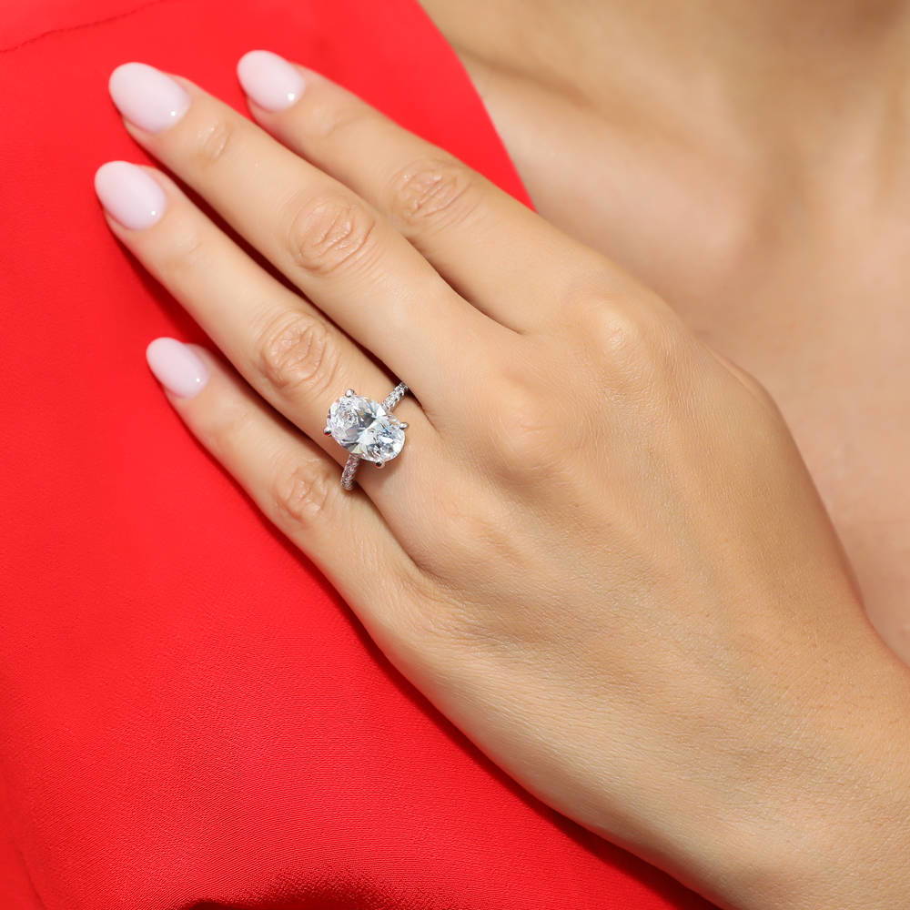 Model wearing Solitaire 5.5ct Oval CZ Ring Set in Sterling Silver, 11 of 13