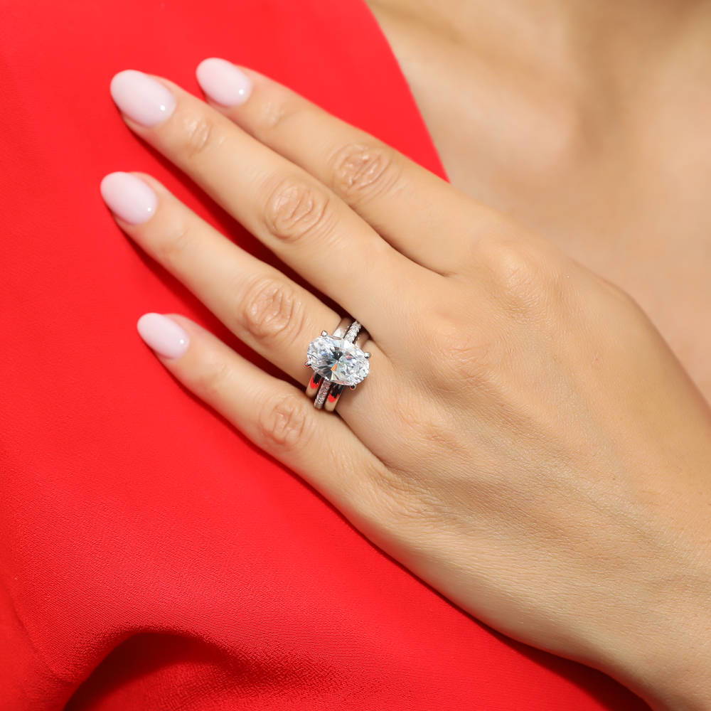 Model wearing Solitaire 5.5ct Oval CZ Ring Set in Sterling Silver, 6 of 12