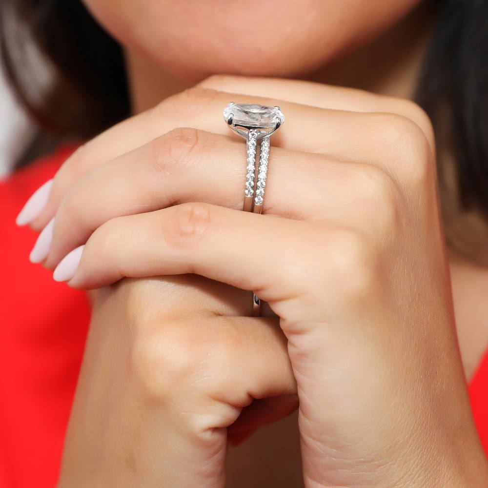 Model wearing Solitaire 5.5ct Oval CZ Ring Set in Sterling Silver, 6 of 14