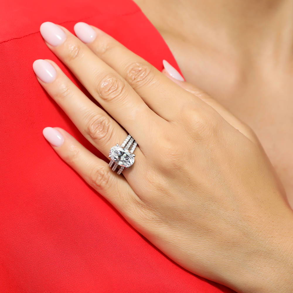 Model wearing Solitaire 5.5ct Oval CZ Ring Set in Sterling Silver, 6 of 13