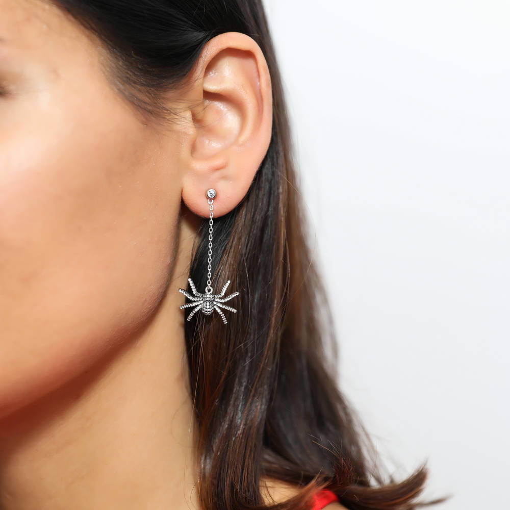 Model wearing Spider CZ Dangle Earrings in Sterling Silver, 2 of 6