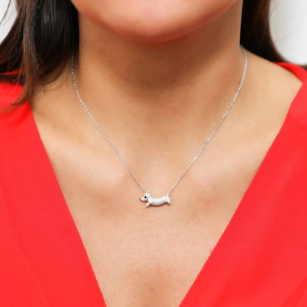 Model wearing Puppy CZ Pendant Necklace in Sterling Silver, 2 of 6