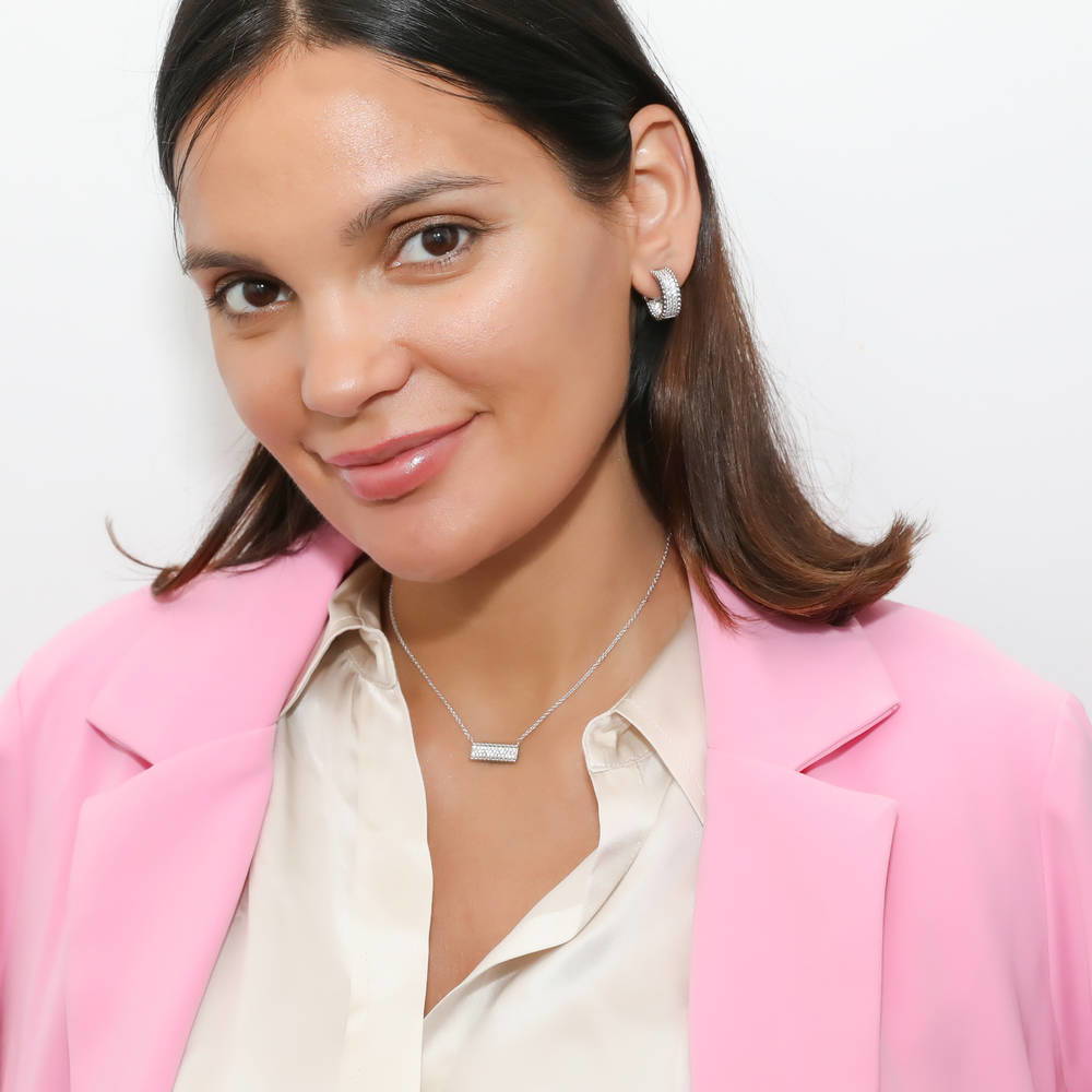 Model wearing Bead CZ Small Omega Back Hoop Earrings in Sterling Silver 0.7 inch, 5 of 5