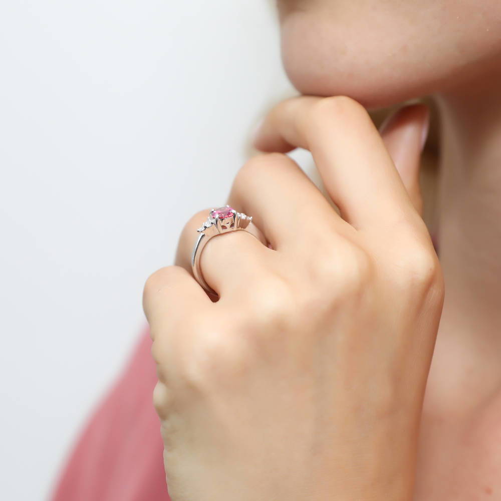 Model wearing Solitaire 1.2ct Red Oval CZ Ring in Sterling Silver, 3 of 7