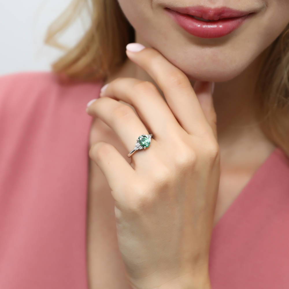 Model wearing Solitaire 1.2ct Green Oval CZ Ring in Sterling Silver, 2 of 7