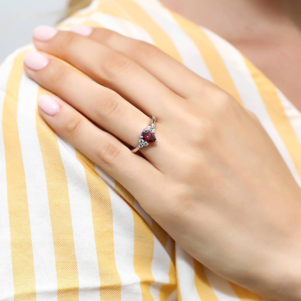 Model wearing Solitaire 0.8ct Red Pear CZ Ring in Sterling Silver, 2 of 7