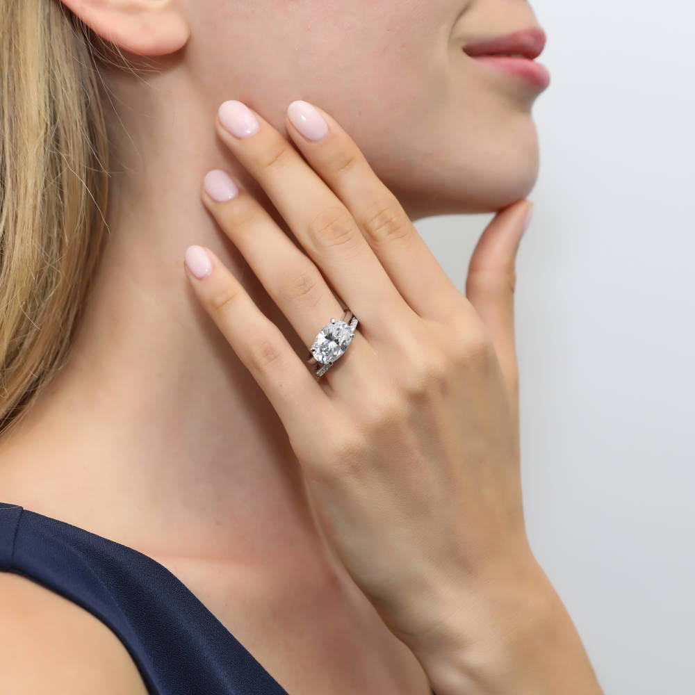 Model wearing Solitaire East-West 5.5ct Oval CZ Ring Set in Sterling Silver, 6 of 13