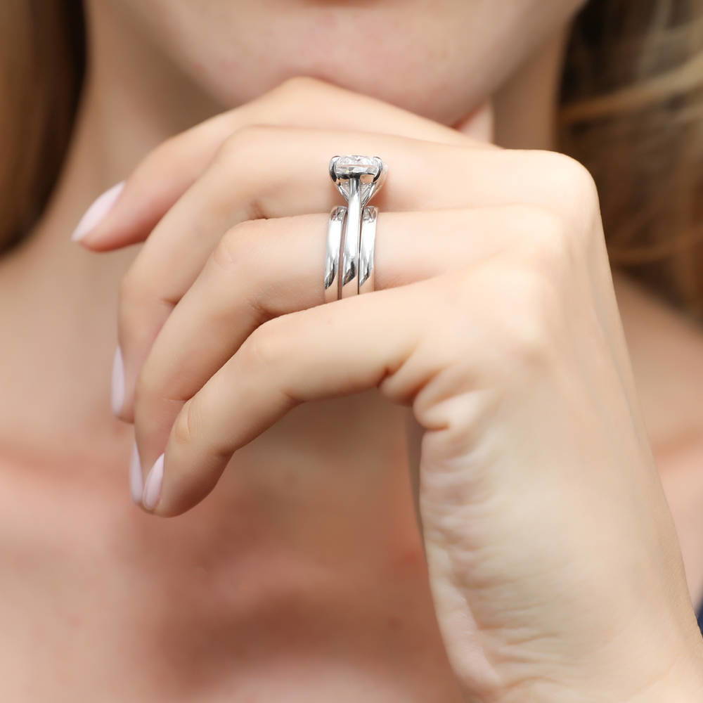Model wearing Solitaire East-West 5.5ct Oval CZ Ring Set in Sterling Silver, 3 of 10
