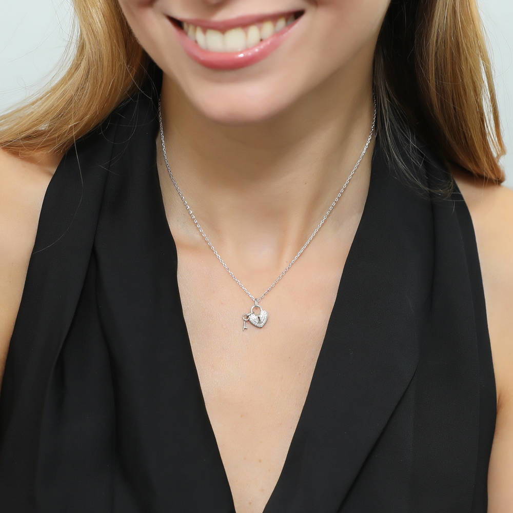 Model wearing Key and Lock Heart CZ Necklace in Sterling Silver, 2 of 5
