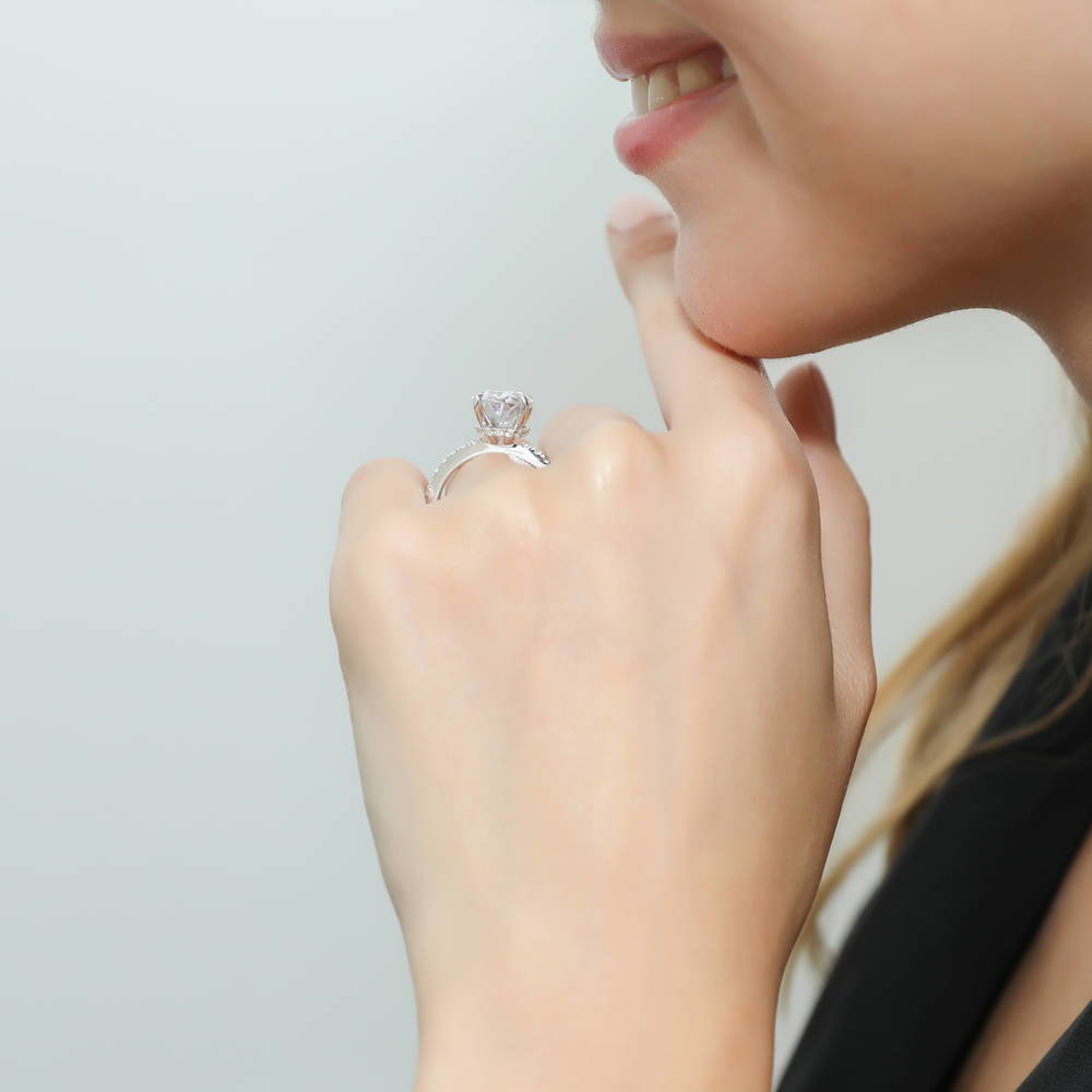 Model wearing Solitaire Hidden Halo 5.5ct Oval CZ Ring Set in Sterling Silver, 9 of 11