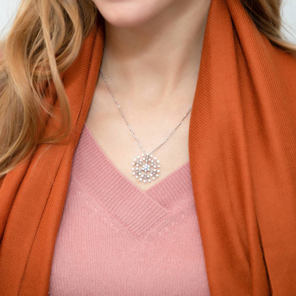 Model wearing Snowflake CZ Necklace in Sterling Silver, 2 of 5