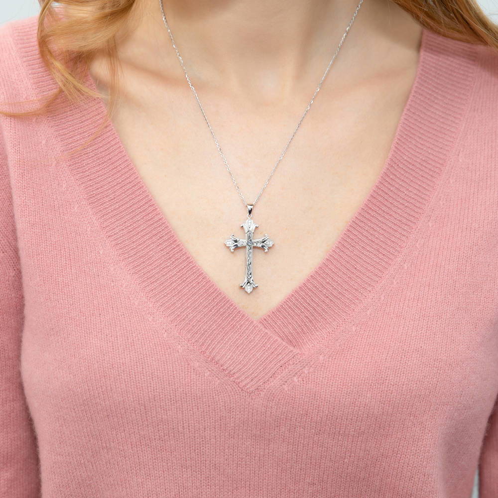 Model wearing Cross Milgrain Filigree CZ Necklace in Sterling Silver, 2 of 4