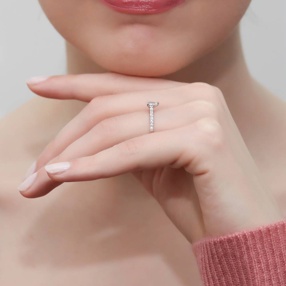 Model wearing Solitaire 0.3ct Pear CZ Ring in Sterling Silver, 10 of 10