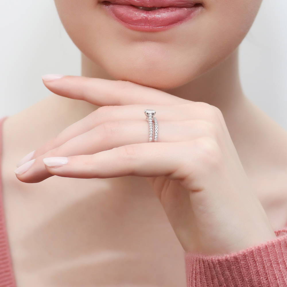 Model wearing Solitaire 0.3ct Emerald Cut CZ Ring in Sterling Silver, 11 of 11