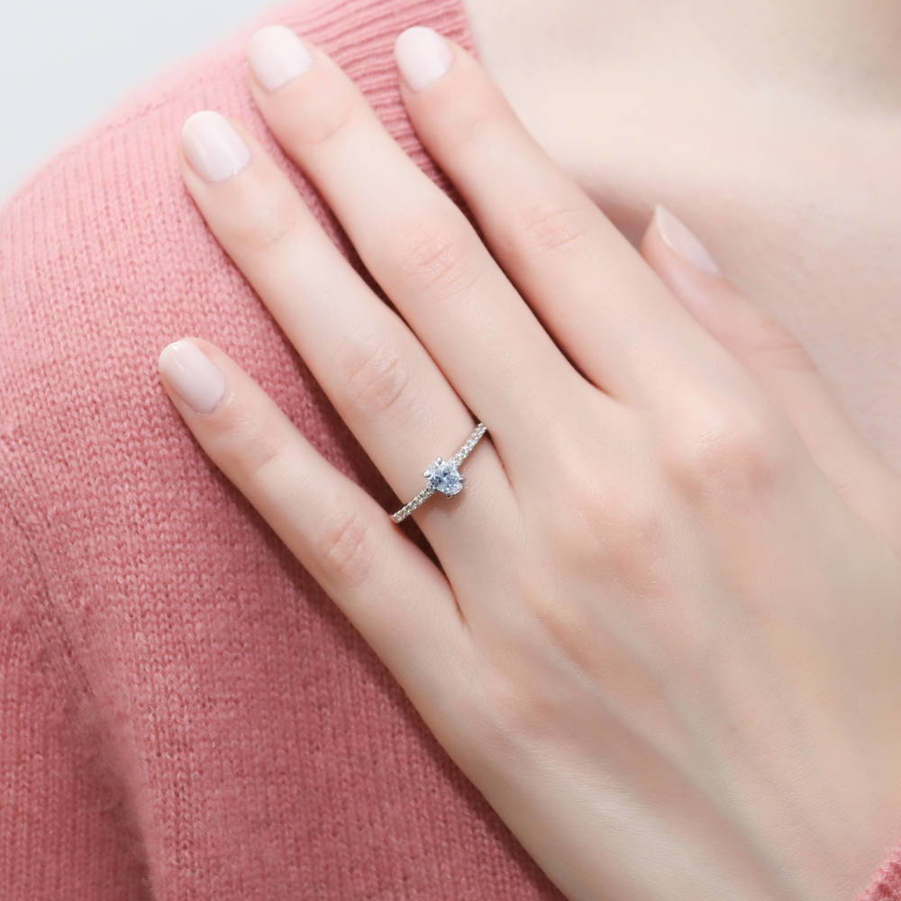 Model wearing Solitaire 0.4ct Oval CZ Ring in Sterling Silver, 2 of 8