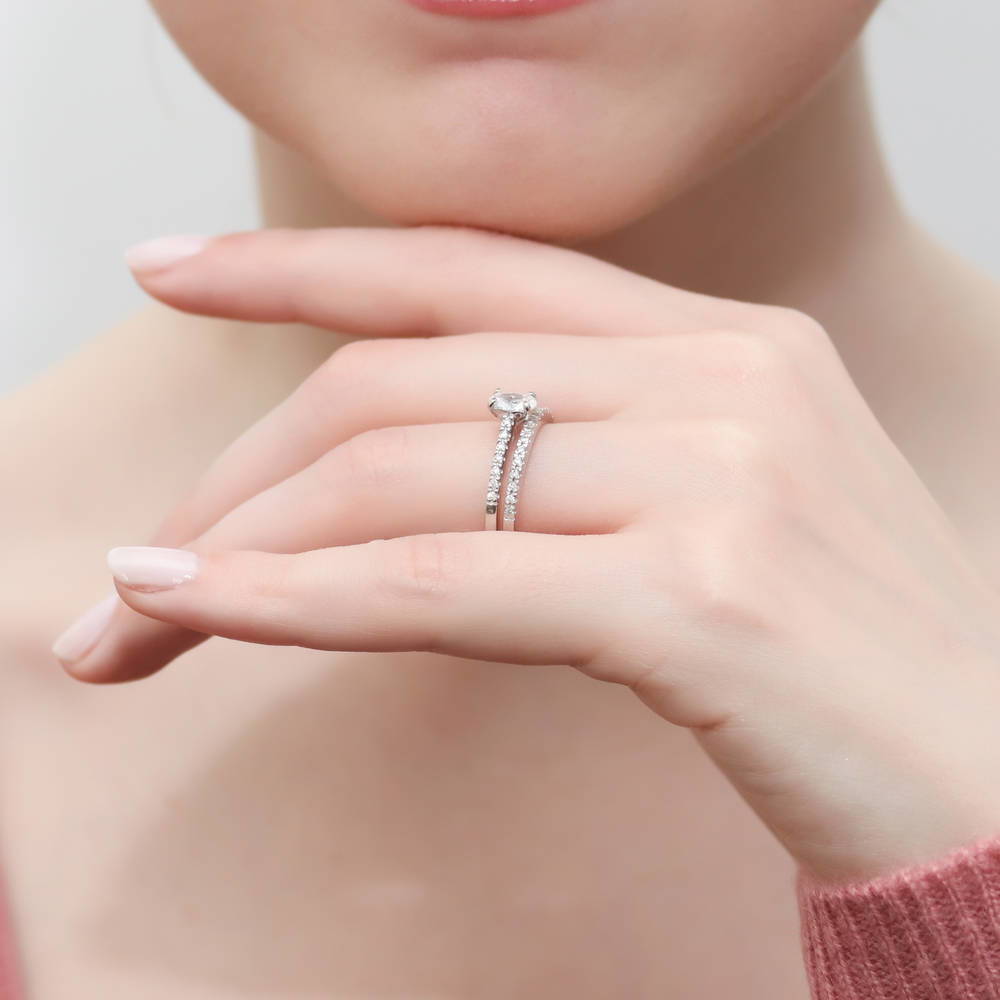 Model wearing Solitaire 0.4ct Oval CZ Ring in Sterling Silver, 11 of 11