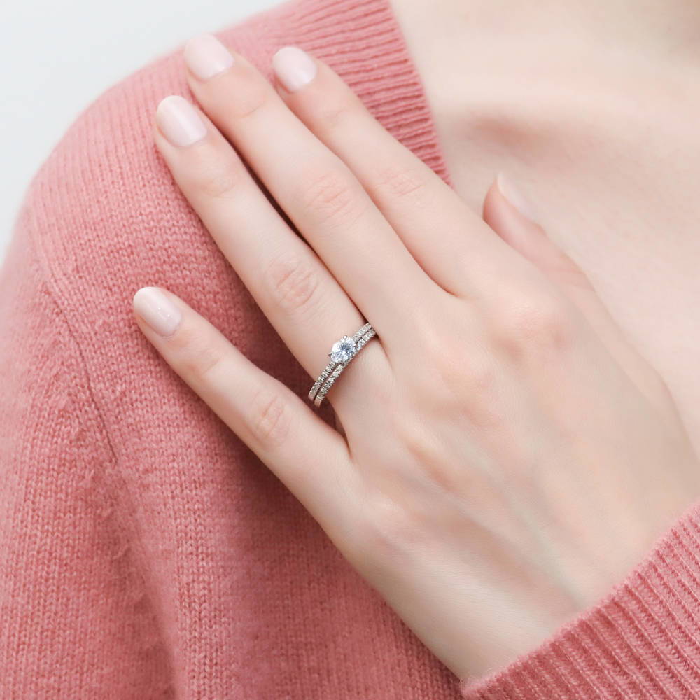 Model wearing Solitaire 0.4ct Oval CZ Ring in Sterling Silver, 9 of 11