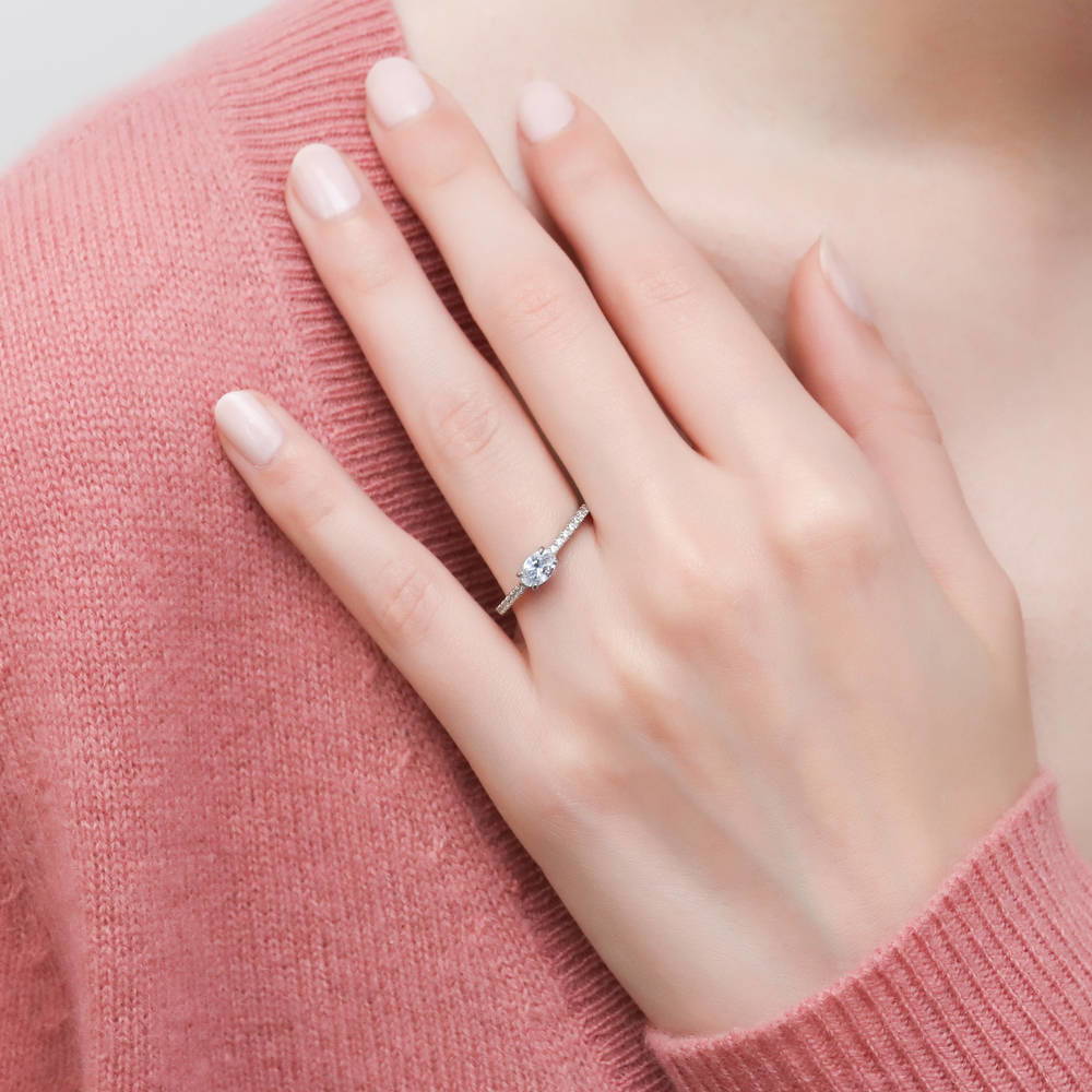 Model wearing Solitaire 0.4ct Oval CZ Ring in Sterling Silver, 2 of 8