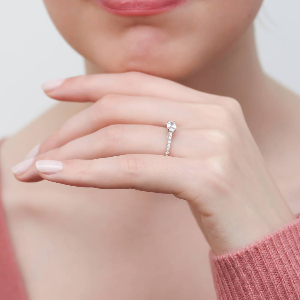 Model wearing Solitaire 0.4ct Oval CZ Ring in Sterling Silver, 6 of 8