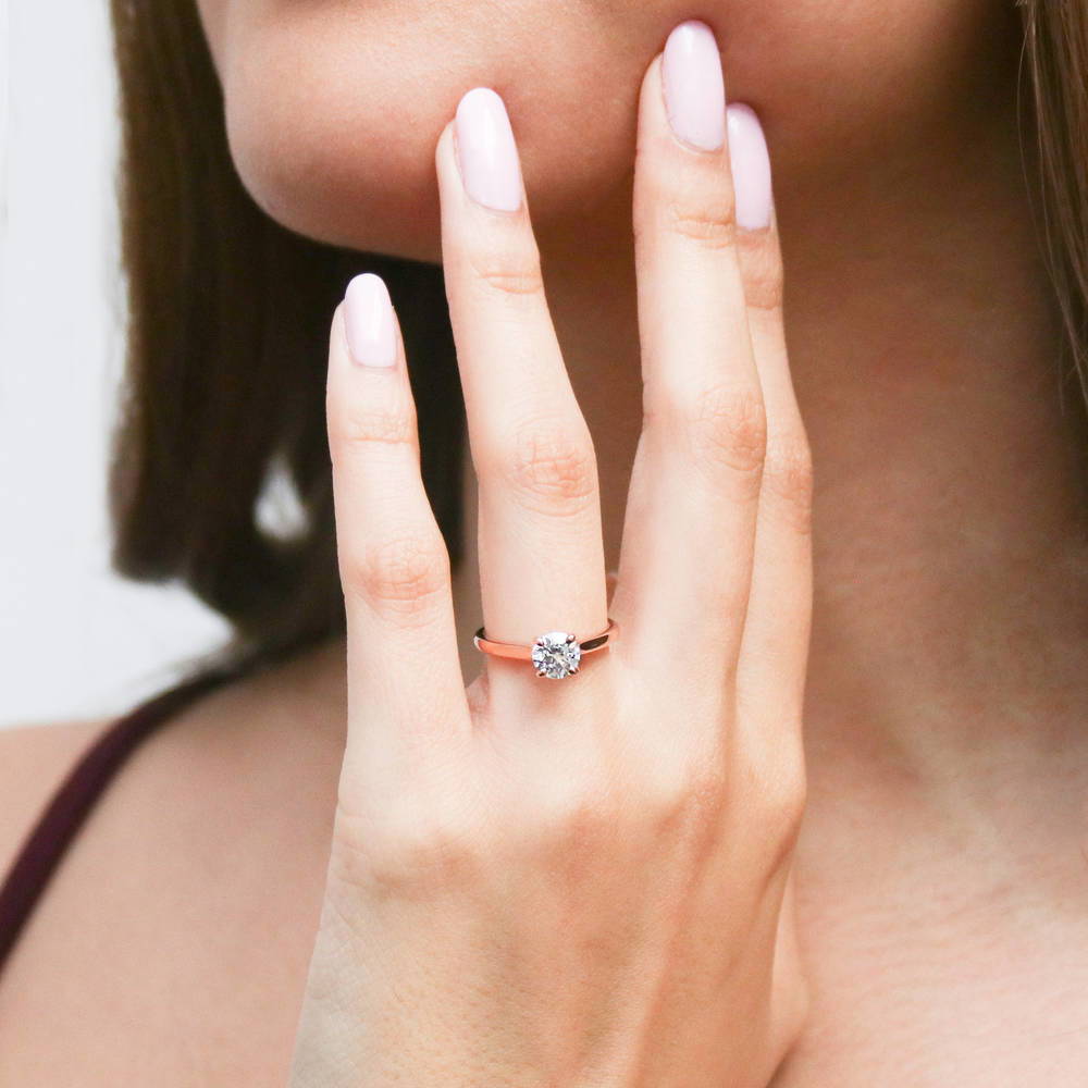 Model wearing Solitaire 0.8ct CZ Ring in Rose Gold Plated Sterling Silver, 3 of 7
